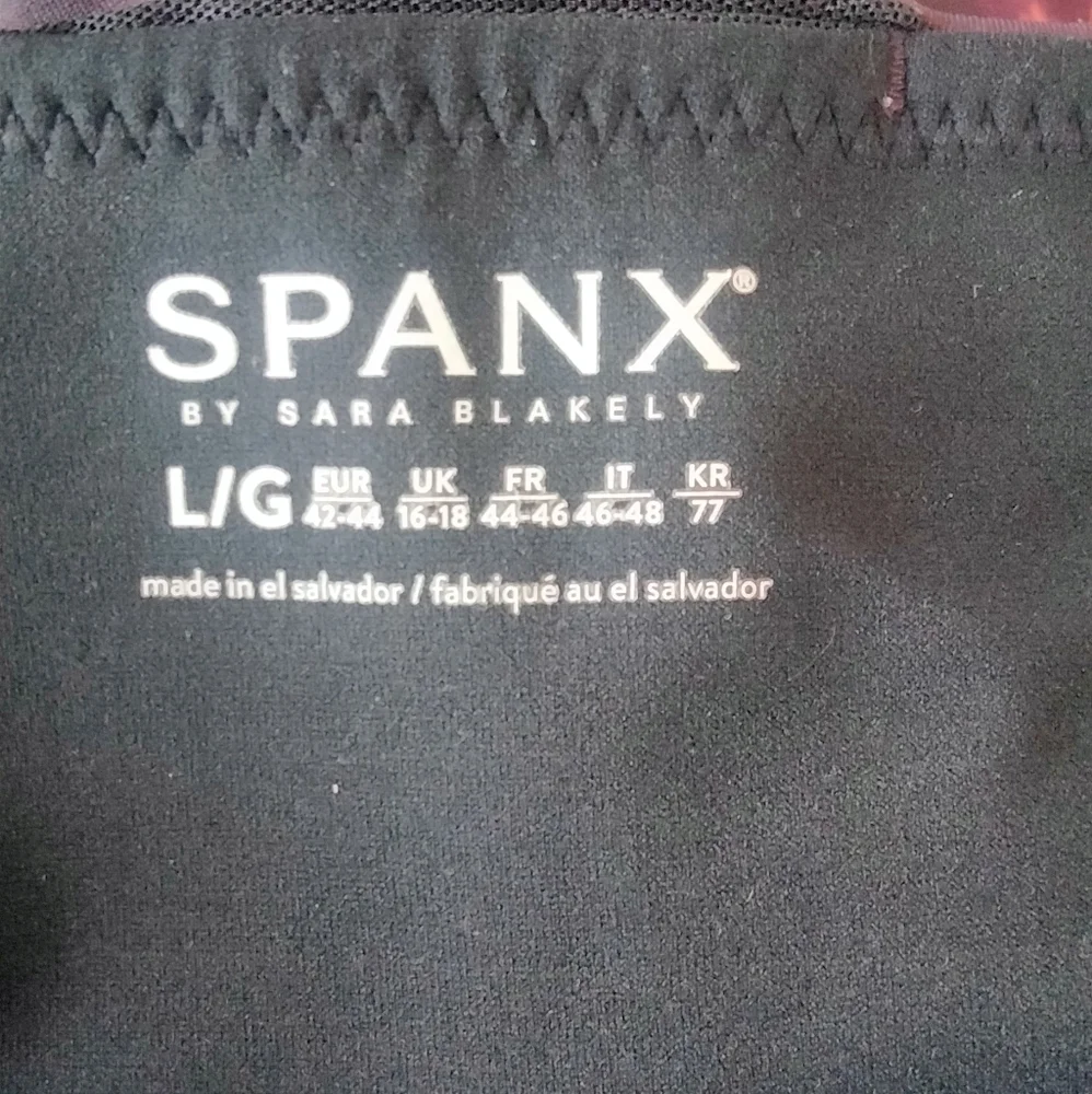 Spanx Size Large Purple and Pink Patterned Leggings